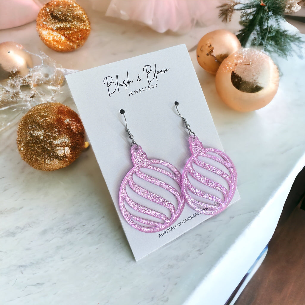 pink glitter bauble christmas earrings with hypoallergenic ear hooks by blush and bloom creations